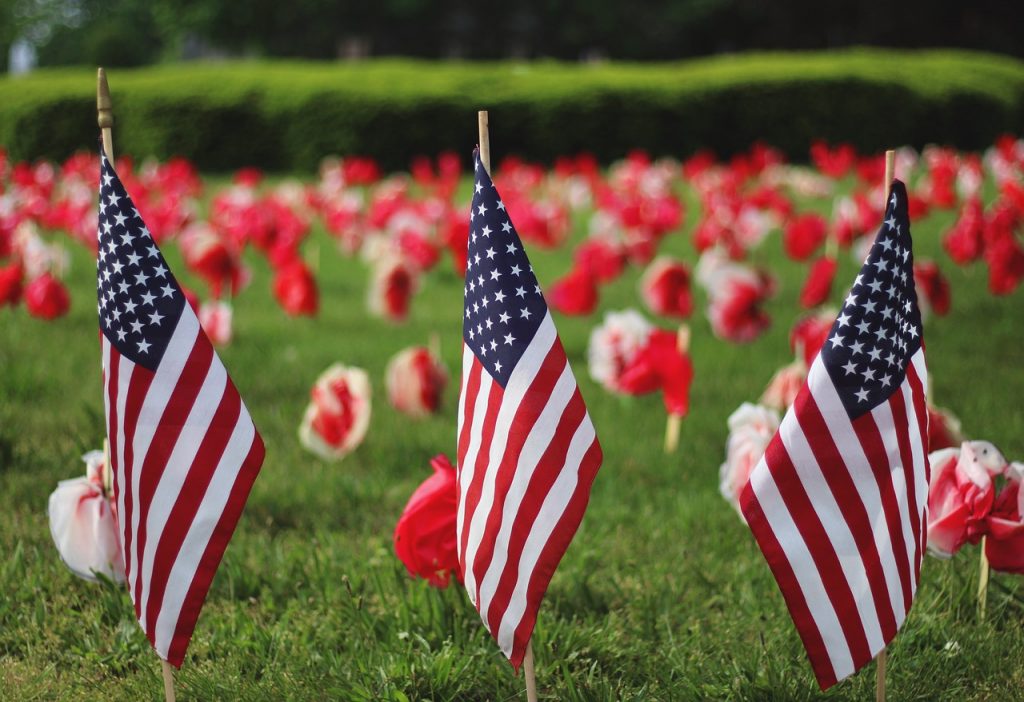 American flags and roses for memorial day